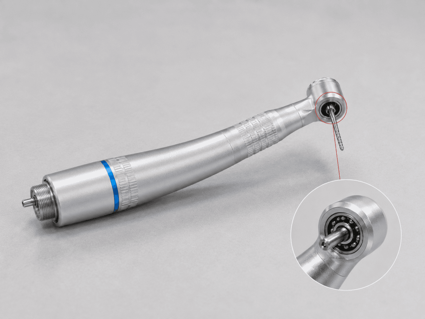 High-speed dental handpiece with compact rotary head