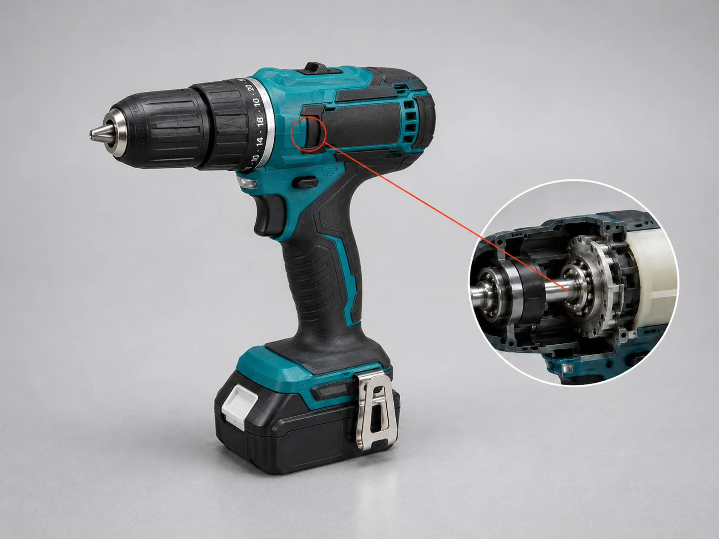Opened cordless drill showing motor, gearbox, shaft and bearings