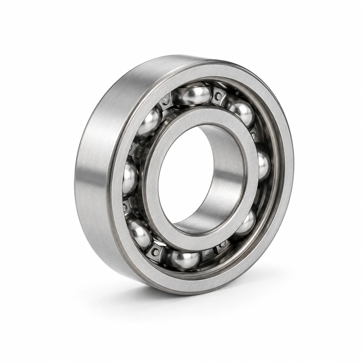 Open deep groove ball bearing showing balls and cage as a closure construction reference
